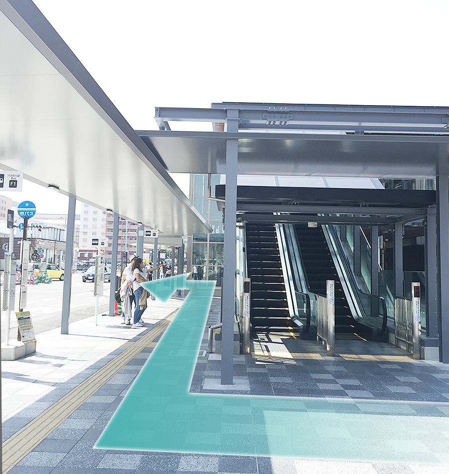 Walk through the left side of the escalator and turn left.